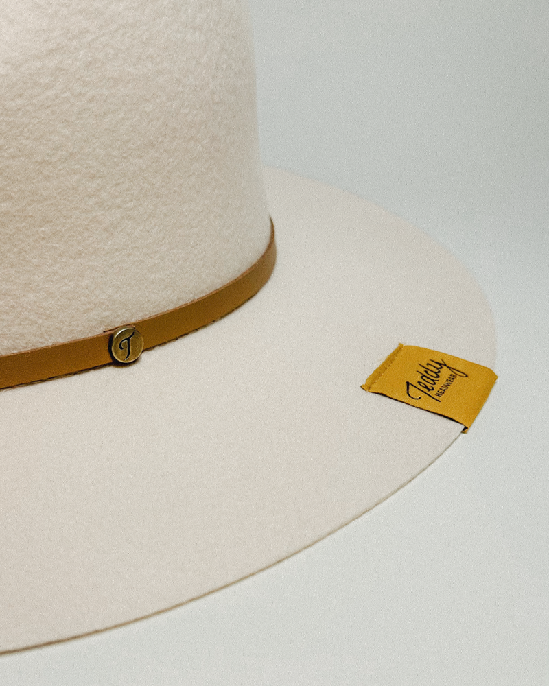 Texas Teddy Headwear detail of branded exterior woven label on brim of 100% Wool hat, fine crafted and designed in America.
