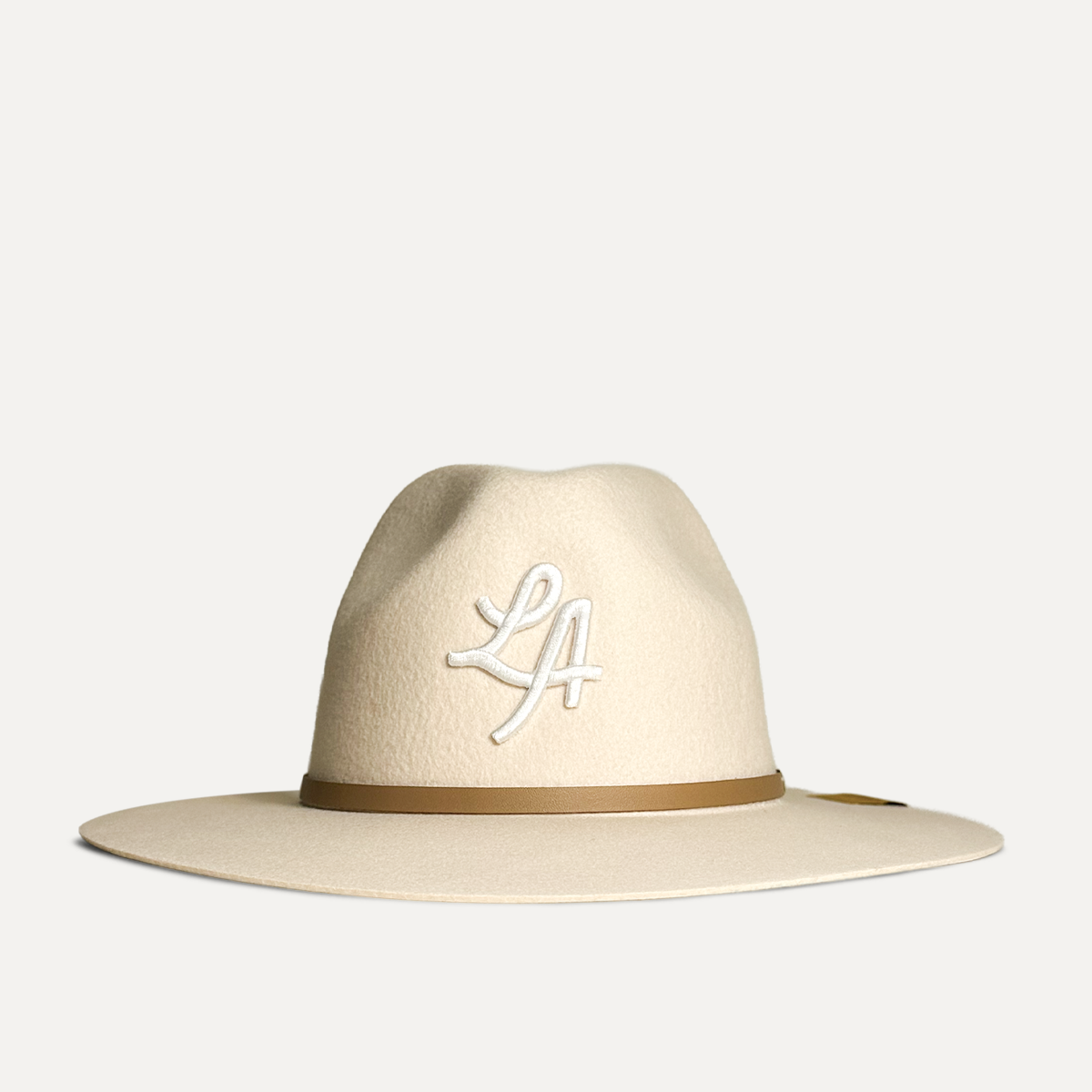 LA Fedora, Soft wool fedora with adjustable sweatband and signature Teddy Headwear embroidered patch offered in two colors, cream and brown. 